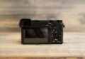 sony camera on top of a wood board