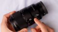 Sony FE 90mm f/2.8 Macro G OSS black lens with OSS switch and focus limiter ring